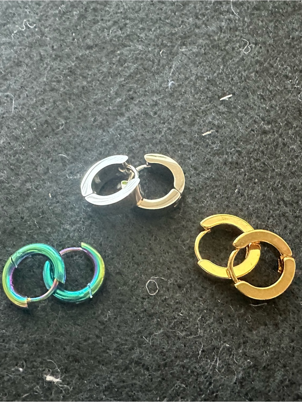 Three stainless Steele Huggie Hoop Earrings